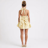 Élan Muse | Backless Pleated Mini Dress