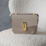 Obsidian Form | Structured Black Leather Shoulder Bag with Gold Clasp