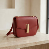 Obsidian Form | Structured Black Leather Shoulder Bag with Gold Clasp