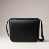 Obsidian Form | Structured Black Leather Shoulder Bag with Gold Clasp
