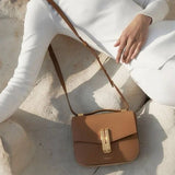 Obsidian Form | Structured Black Leather Shoulder Bag with Gold Clasp