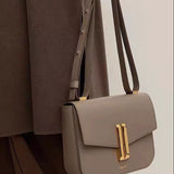 Obsidian Form | Structured Black Leather Shoulder Bag with Gold Clasp