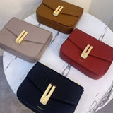 Obsidian Form | Structured Black Leather Shoulder Bag with Gold Clasp